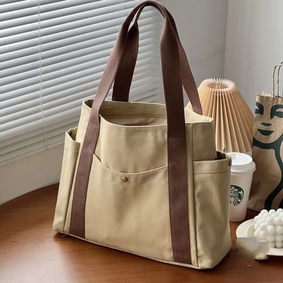 กระเป๋าผ้าใบ Tote ออกไปผ้าใบทั้งหมดในหนึ่งงาน ระดับการปรากฏตัวสูง การเดินทาง ความจุใหญ่นักศิลปะนักเรียนหนาเดียว
